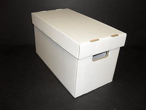 white cardboard storage boxes with lids